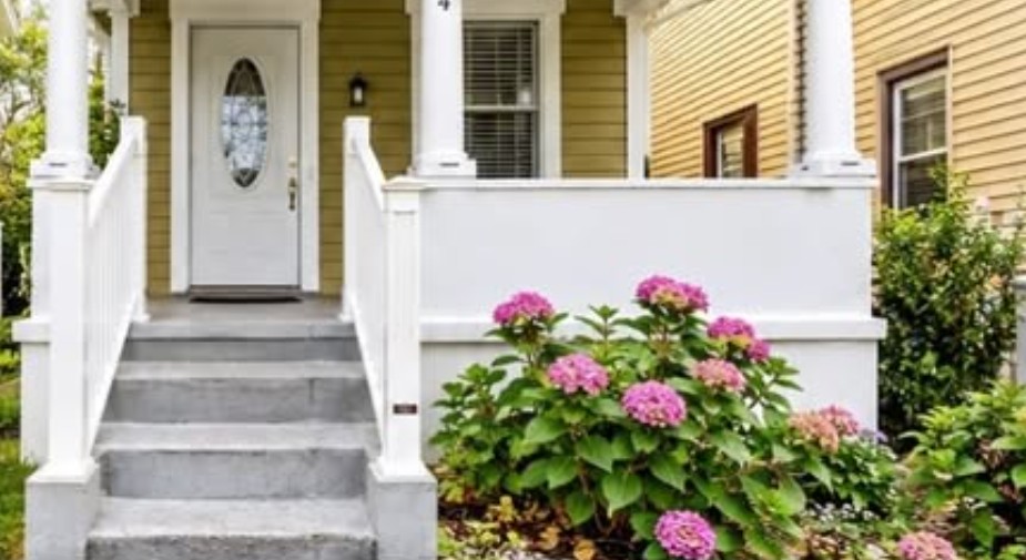 Cropped front-porch and doorway detail at 1114 Summerfield Avenue; the roof and full exterior are not shown.